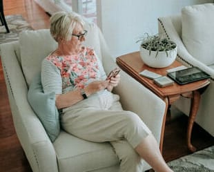 senior woman with phone e1678721029503 | will you change your life in 2023?