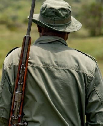 every man please stand behind a ranger with a rifle